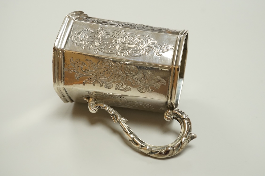 An early Victorian engraved silver octagonal christening mug, William Hunter, London, 1843, height 10.3cm, 5.1oz.